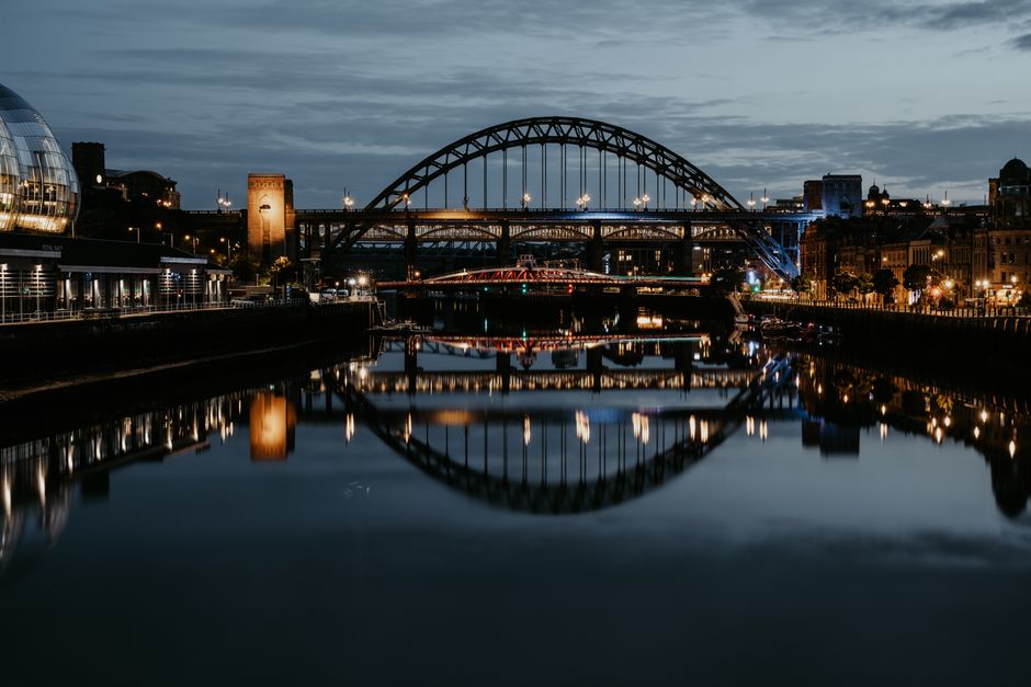 The Tyne Bridge at night, seen from the Gateshead bank of the river